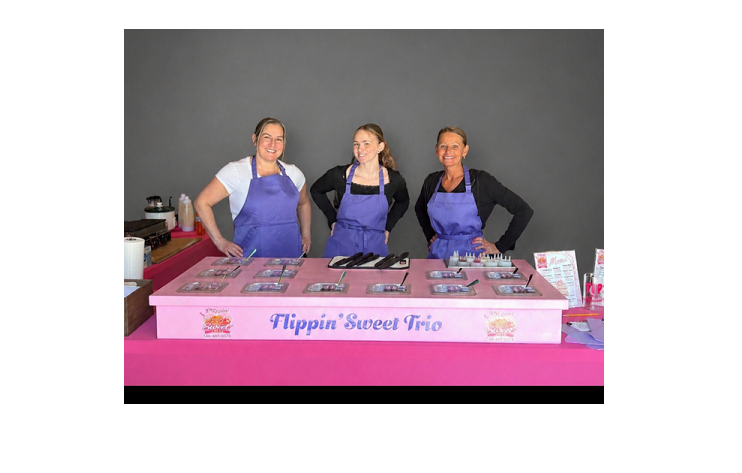 The Flippin' Sweet Trio team at their live pancake station